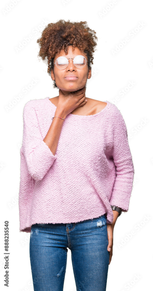 Beautiful young african american woman wearing glasses over isolated background Touching painful neck, sore throat for flu, clod and infection Beautiful young african american woman wearing glasses over isolated background Touching painful neck, sore throat for flu, clod and infection
