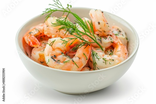 Festive appetizer freshly roasted black tiger shrimp with garlic cream and dill in a small bowl on white background close up focus