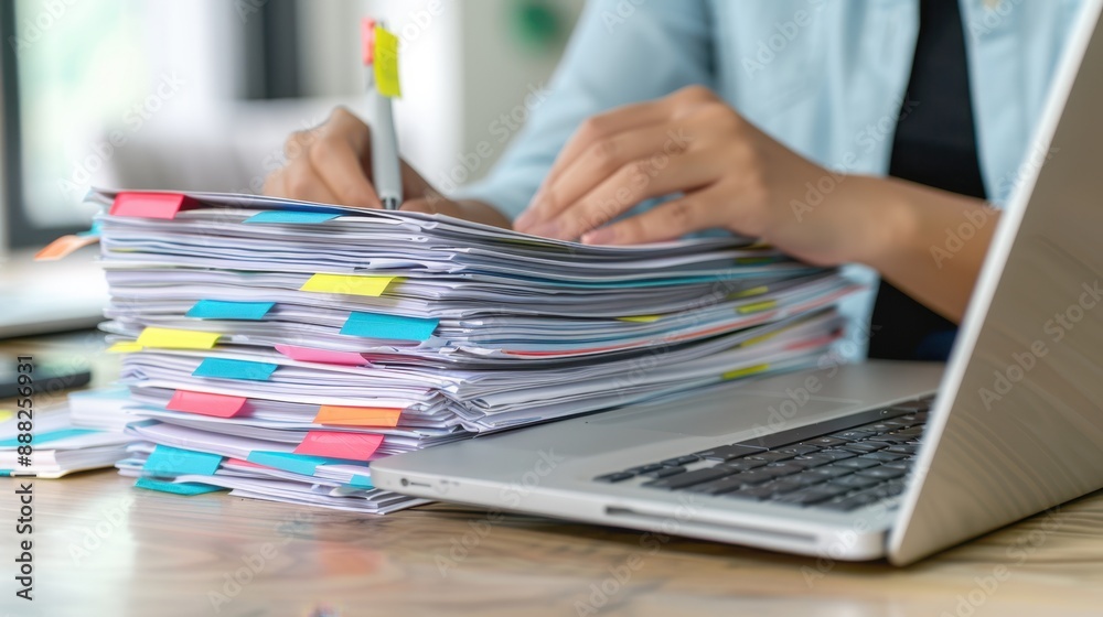 The stack of organized paperwork The stack of organized paperwork
