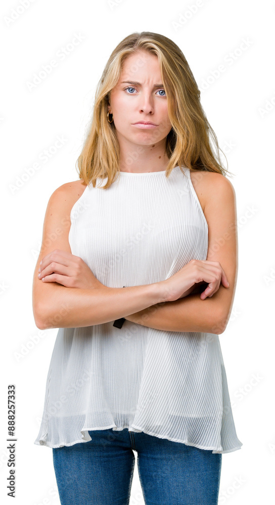 Fototapeta premium Beautiful young elegant woman over isolated background skeptic and nervous, disapproving expression on face with crossed arms. Negative person.