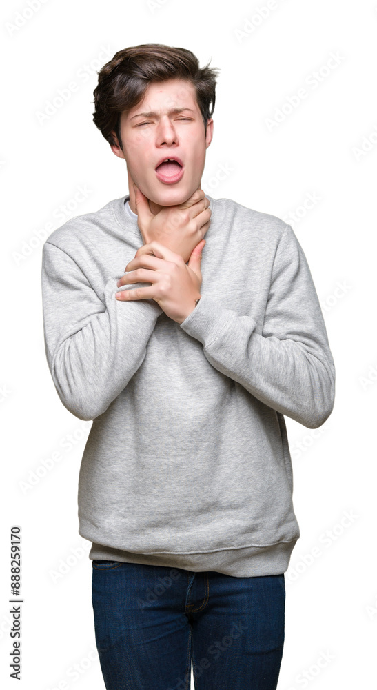 Young handsome sporty man wearing sweatshirt over isolated background shouting and suffocate because painful strangle. Health problem. Asphyxiate and suicide concept. Young handsome sporty man wearing sweatshirt over isolated background shouting and suffocate because painful strangle. Health problem. Asphyxiate and suicide concept.