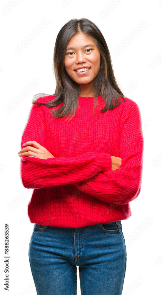 Young asian woman wearing winter sweater over isolated background happy face smiling with crossed arms looking at the camera. Positive person. Young asian woman wearing winter sweater over isolated background happy face smiling with crossed arms looking at the camera. Positive person.