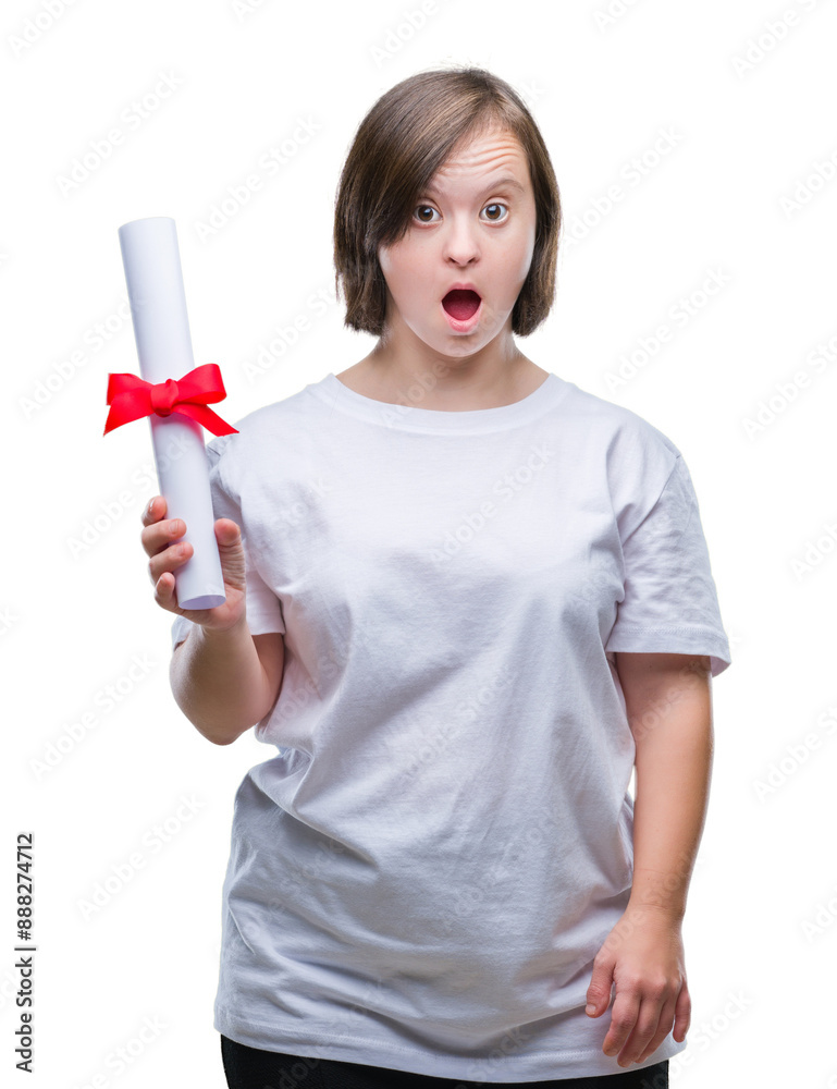 Young adult woman with down syndrome holding degree over isolated background scared in shock with a surprise face, afraid and excited with fear expression Young adult woman with down syndrome holding degree over isolated background scared in shock with a surprise face, afraid and excited with fear expression