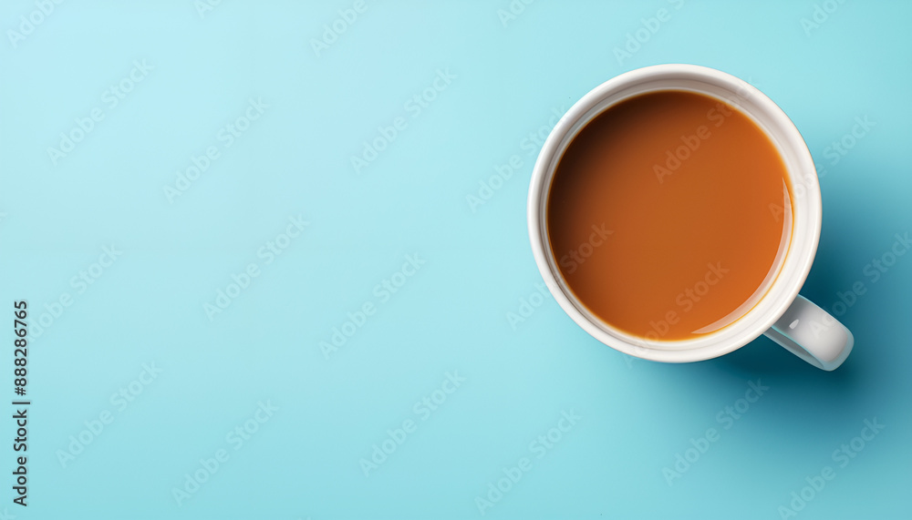 Tasty coffee in cup on light blue background, top view Tasty coffee in cup on light blue background, top view