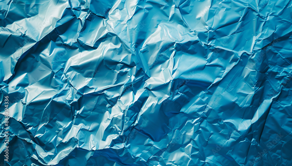Fototapeta premium Beautiful blue foil as background, top view