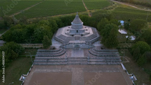 Aerial view of The Mausoleum of  Heroes of World War I from Marasesti, Romania. Photography was taken from a drone while lowering altitude and tilting the camera up with the building in the view.