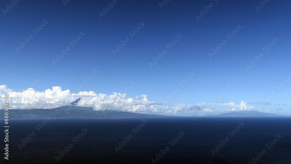 Viewpoint in São Jorge Island, where you can see the Pico Island top of the mountain. Azores, Portugal. Viewpoint in São Jorge Island, where you can see the Pico Island top of the mountain. Azores, Portugal.