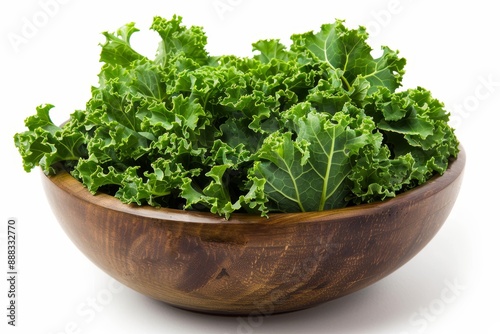 Green curly kale leaves in a white bowl macro shot © LimeSky