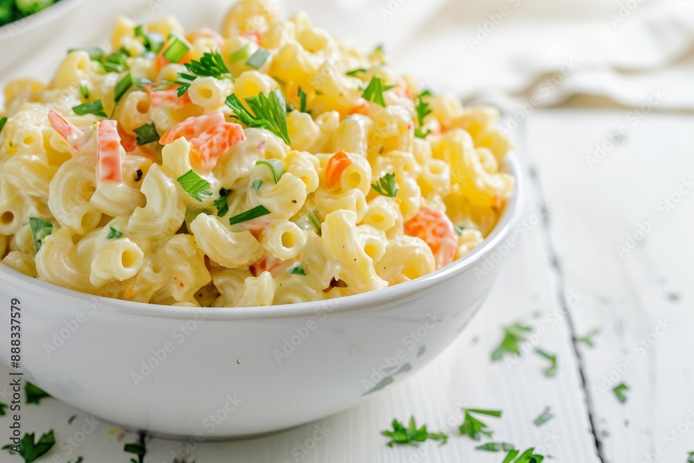Homemade macaroni salad in white bowl on wooden background Close up view Homemade macaroni salad in white bowl on wooden background Close up view