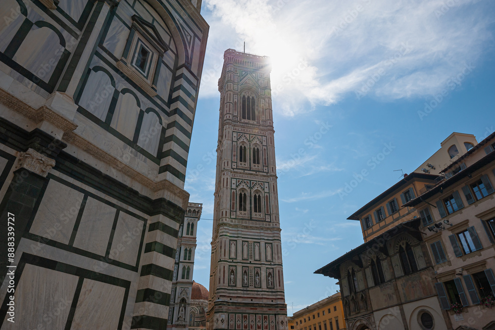 Tower of the famous Florence Cathedral is lit from behind by the sun Tower of the famous Florence Cathedral is lit from behind by the sun
