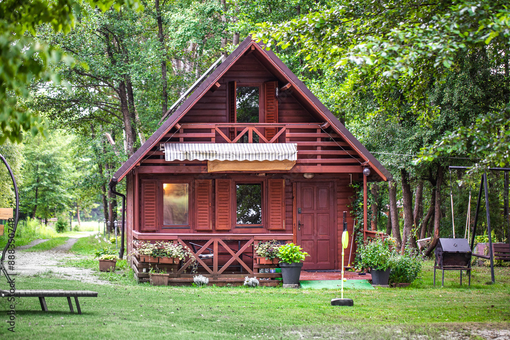 A summer house surrounded by a green forest. Cottage for rent. A cottage in the forest. House by the lake. A wooden house for relaxation. A summer house surrounded by a green forest. Cottage for rent. A cottage in the forest. House by the lake. A wooden house for relaxation.