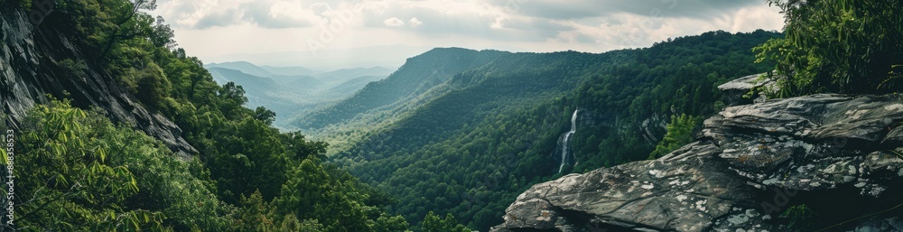 Fototapeta premium Mountainous Landscape with a Waterfall