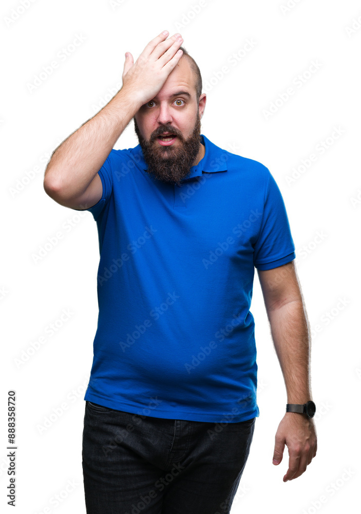 Young caucasian hipster man wearing blue shirt over isolated background surprised with hand on head for mistake, remember error. Forgot, bad memory concept. Young caucasian hipster man wearing blue shirt over isolated background surprised with hand on head for mistake, remember error. Forgot, bad memory concept.