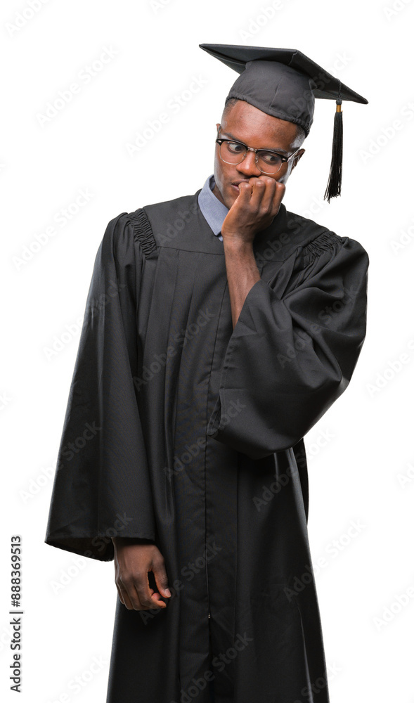 Young graduated african american man over isolated background looking stressed and nervous with hands on mouth biting nails. Anxiety problem. Young graduated african american man over isolated background looking stressed and nervous with hands on mouth biting nails. Anxiety problem.
