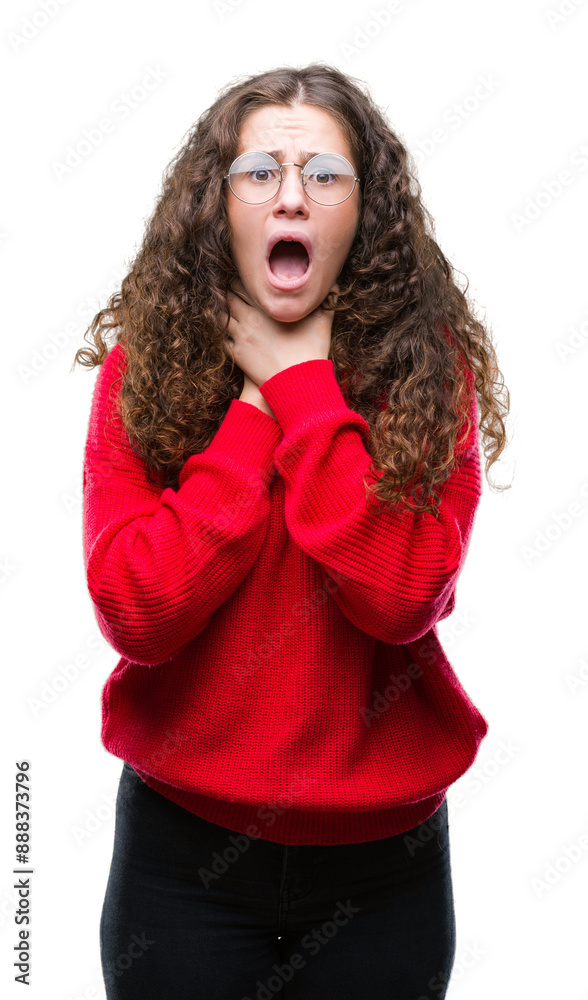 Beautiful brunette curly hair young girl wearing glasses and winter sweater over isolated background shouting and suffocate because painful strangle. Health problem. Asphyxiate and suicide concept. Beautiful brunette curly hair young girl wearing glasses and winter sweater over isolated background shouting and suffocate because painful strangle. Health problem. Asphyxiate and suicide concept.