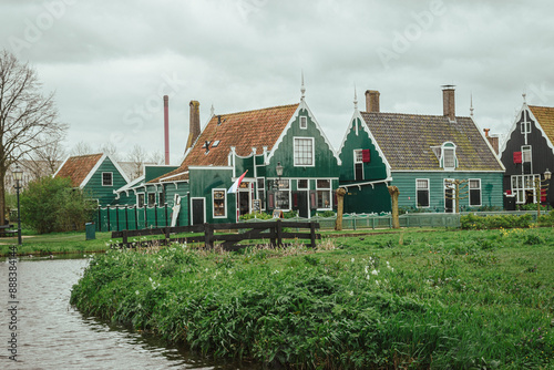 Green typical houses in De Zaanse Schans, Nertherlands photo