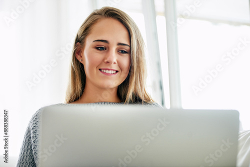 Remote work, woman and smile with laptop for news, research and email at home. Female student, happy and computer in living room for job searching, internship opportunity and feedback in Australia