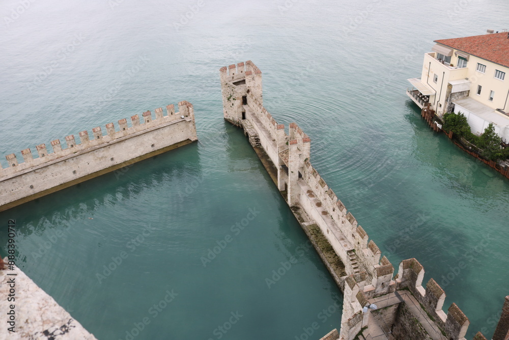 Scaliger castle in the historical center of Sirmione town near Garda lake in Italy. Scaliger castle in the historical center of Sirmione town near Garda lake in Italy.