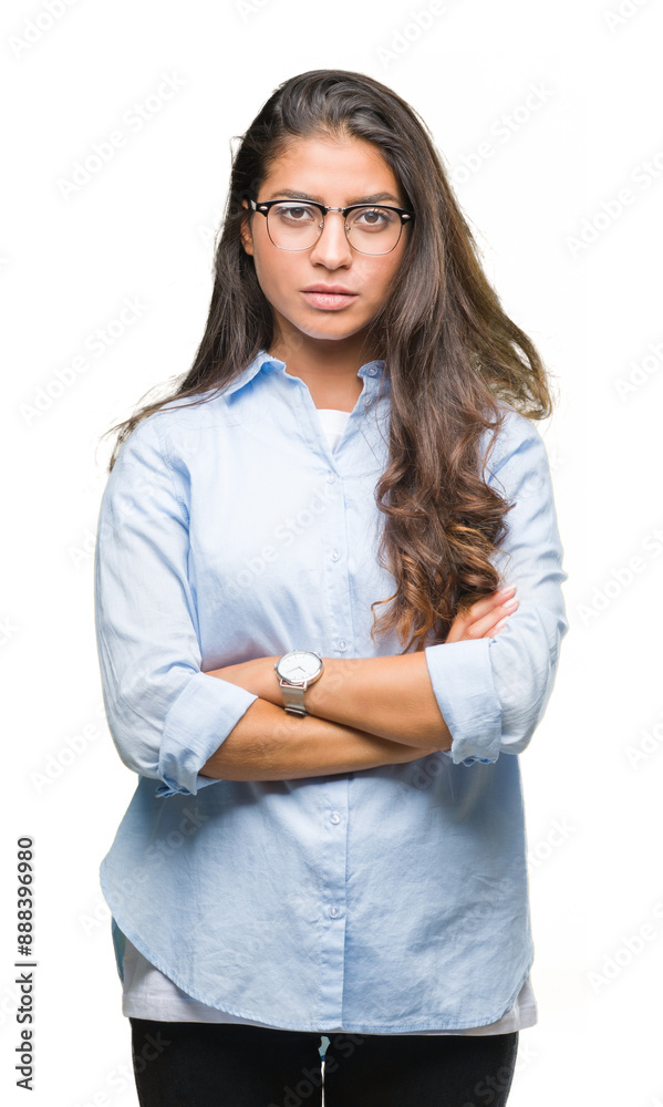 Young beautiful arab woman wearing glasses over isolated background skeptic and nervous, disapproving expression on face with crossed arms. Negative person. Young beautiful arab woman wearing glasses over isolated background skeptic and nervous, disapproving expression on face with crossed arms. Negative person.