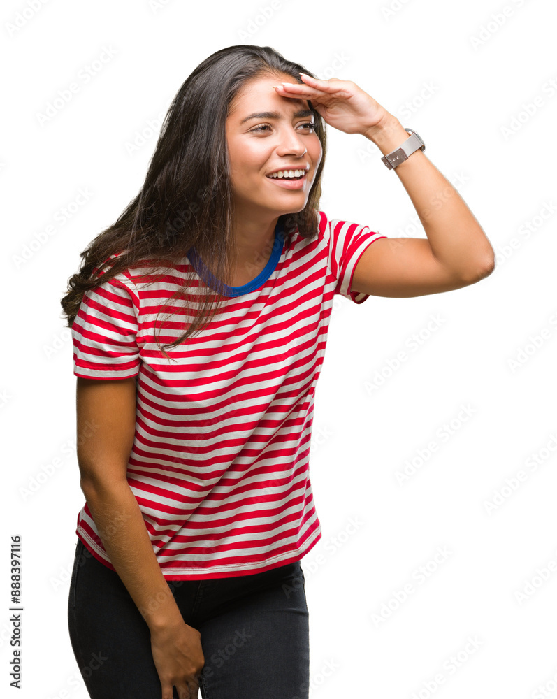 Young beautiful arab woman over isolated background very happy and smiling looking far away with hand over head. Searching concept. Young beautiful arab woman over isolated background very happy and smiling looking far away with hand over head. Searching concept.