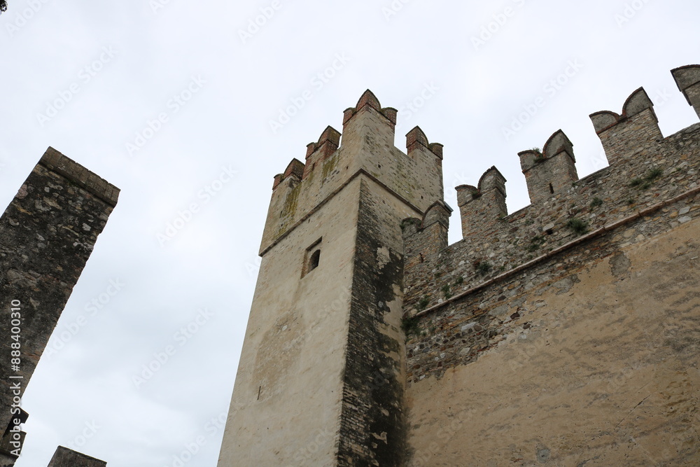 Scaliger castle in the historical center of Sirmione town near Garda lake in Italy. Scaliger castle in the historical center of Sirmione town near Garda lake in Italy.