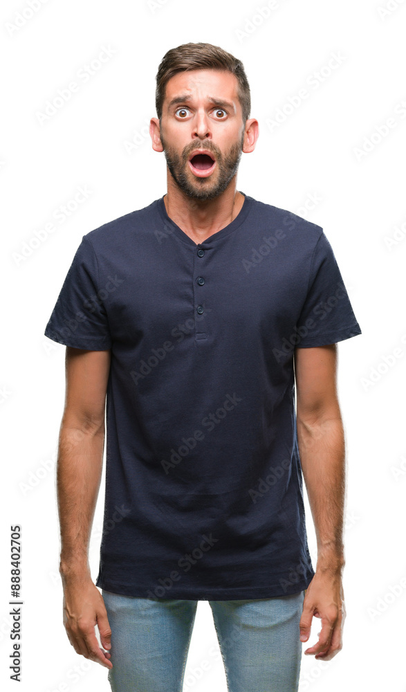 Young handsome man over isolated background afraid and shocked with surprise expression, fear and excited face. Young handsome man over isolated background afraid and shocked with surprise expression, fear and excited face.