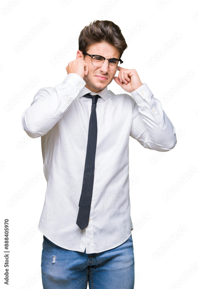 Young business man wearing glasses over isolated background covering ears with fingers with annoyed expression for the noise of loud music. Deaf concept. Young business man wearing glasses over isolated background covering ears with fingers with annoyed expression for the noise of loud music. Deaf concept.