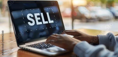 Person Typing Sell on Laptop Computer at Desk