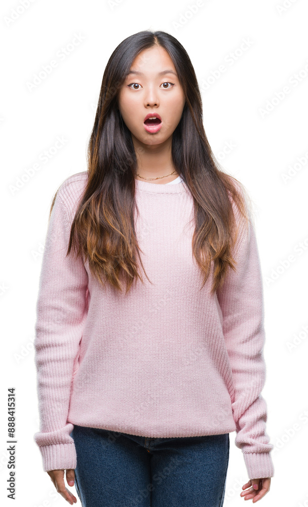 Young asian woman over isolated background afraid and shocked with surprise expression, fear and excited face. Young asian woman over isolated background afraid and shocked with surprise expression, fear and excited face.