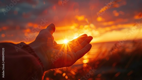 Help hand on sunset background photo