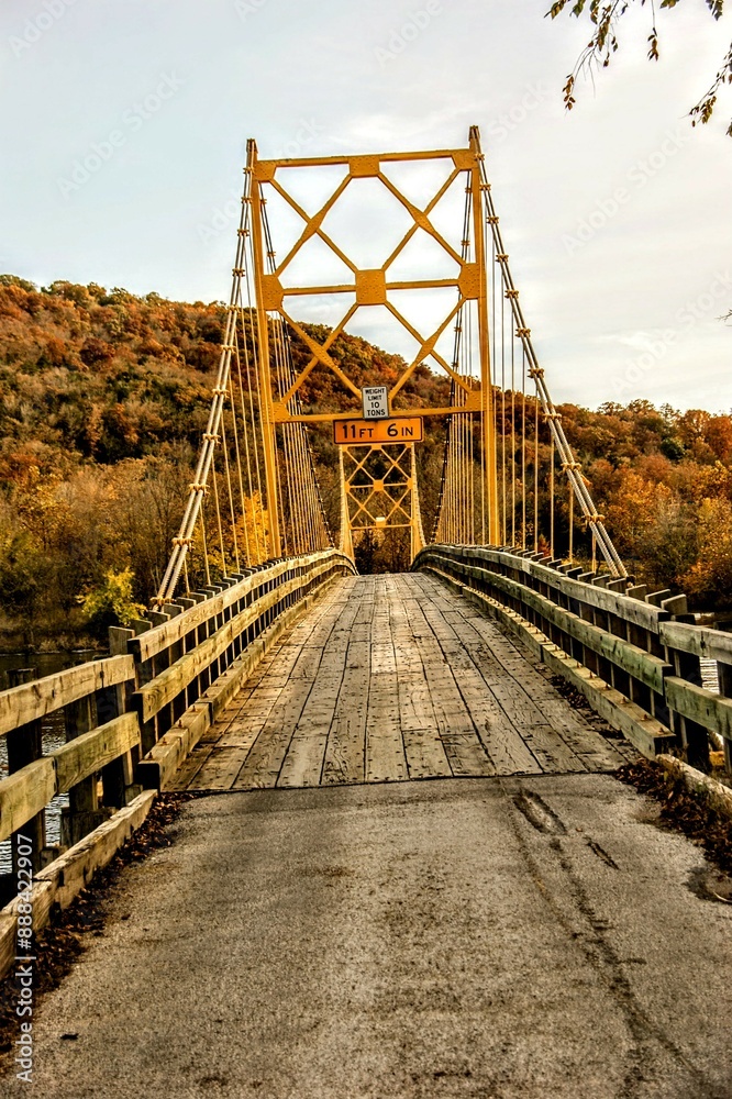 Fototapeta premium Beautiful Rustic Golden Bridge View in Autumn in the Midwest Heartland of America