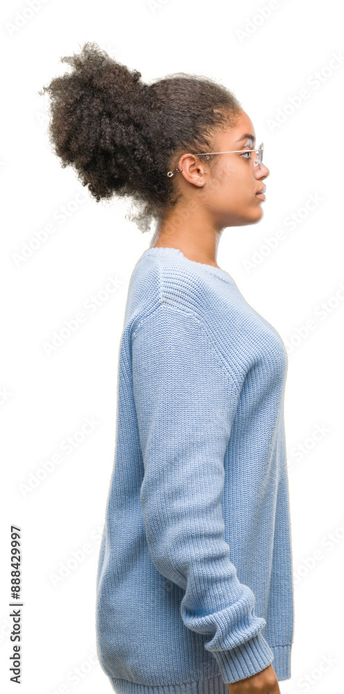 Young afro american woman wearing glasses over isolated background looking stressed and nervous with hands on mouth biting nails. Anxiety problem. Young afro american woman wearing glasses over isolated background looking stressed and nervous with hands on mouth biting nails. Anxiety problem.