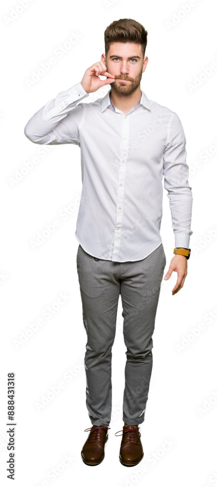 Young handsome business man mouth and lips shut as zip with fingers. Secret and silent, taboo talking Young handsome business man mouth and lips shut as zip with fingers. Secret and silent, taboo talking
