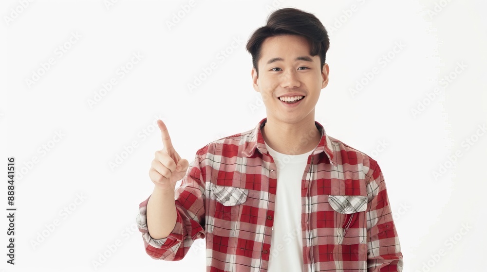 Happy Asian man pointing at advertisement banner on white background. Happy Asian man pointing at advertisement banner on white background.