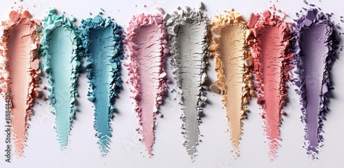 Crushed Eyeshadow Palette With Various Shades on White Background