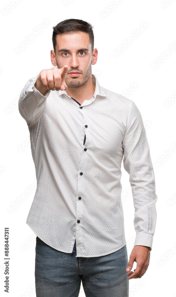 Handsome young business man pointing with finger to the camera and to you, hand sign, positive and confident gesture from the front Handsome young business man pointing with finger to the camera and to you, hand sign, positive and confident gesture from the front
