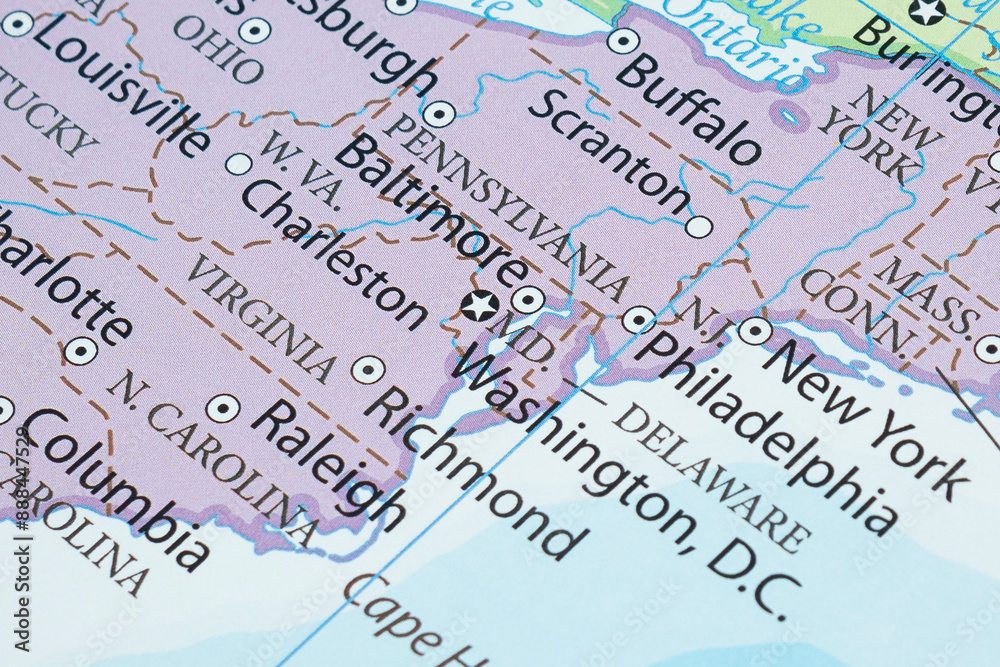 Fototapeta premium Macro photography of Washington DC city into political United States of America map with important cities
