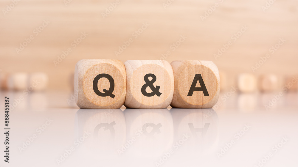 wooden cubes with letters Q and A. q and a - short for Question and Answer wooden cubes with letters Q and A. q and a - short for Question and Answer