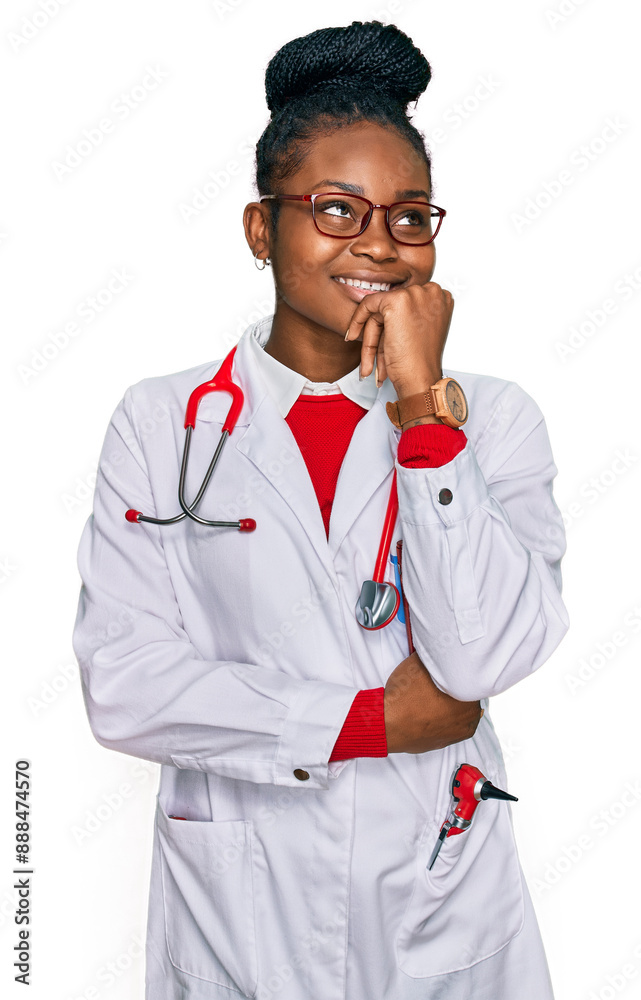Young african american woman wearing doctor uniform and stethoscope with hand on chin thinking about question, pensive expression. smiling and thoughtful face. doubt concept. Young african american woman wearing doctor uniform and stethoscope with hand on chin thinking about question, pensive expression. smiling and thoughtful face. doubt concept.