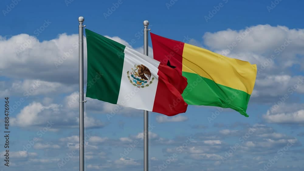 Guinea-Bissau and Mexico flags flying together, video concept of the relationship, two country relations concept Guinea-Bissau and Mexico flags flying together, video concept of the relationship, two country relations concept