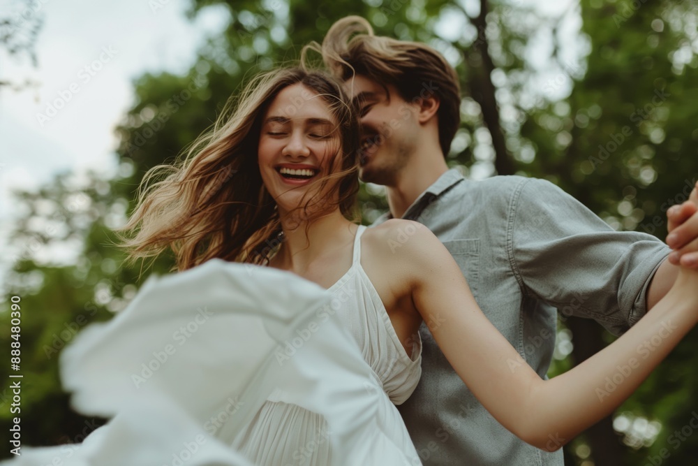 Happy couple dancing outdoors in the park happiness concept Happy couple dancing outdoors in the park happiness concept
