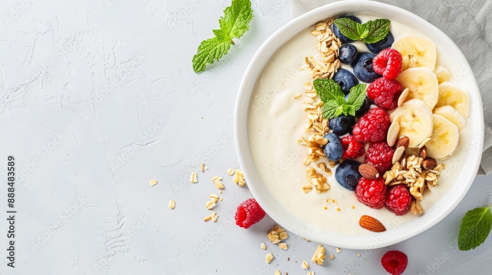 Top view of a vibrant smoothie bowl topped with fresh fruits, chia seeds, and nuts, highlighting the rich plant-based nutrients in a colorful, appetizing presentation Top view of a vibrant smoothie bowl topped with fresh fruits, chia seeds, and nuts, highlighting the rich plant-based nutrients in a colorful, appetizing presentation