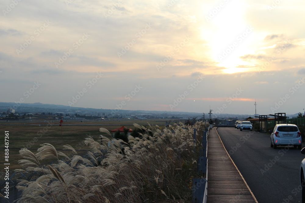 Obraz premium sunset on the Jeju international airport