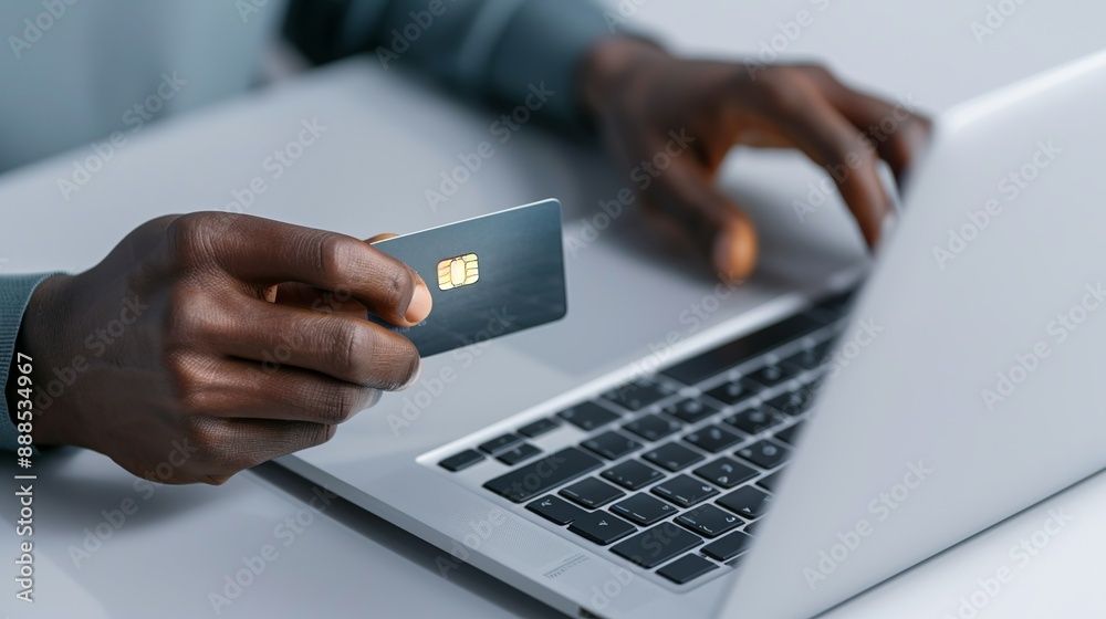 Hands holding a credit card and entering information on a laptop, illustrating online transactions and e-commerce in the business world. Height Resolution Photo, , Minimalism, Hands holding a credit card and entering information on a laptop, illustrating online transactions and e-commerce in the business world. Height Resolution Photo, , Minimalism,