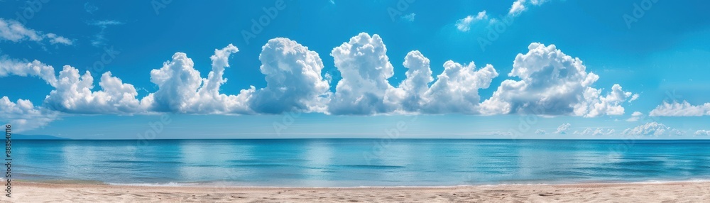 Serene panoramic view of a tranquil beach with azure waters and a clear blue sky, featuring majestic clouds in the background. Serene panoramic view of a tranquil beach with azure waters and a clear blue sky, featuring majestic clouds in the background.