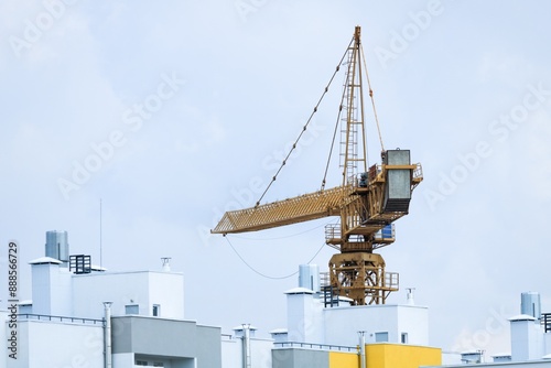 The architectural complex of residential buildings on sky background