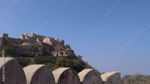 ancient fort ruins with bright blue sky from unique perspective at morning video is taken at Kumbhal fort kumbhalgarh rajasthan india. photo