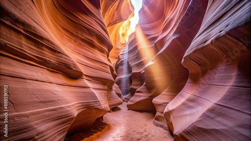 Narrow slot canyon with stunning light beams and smooth, curved walls, Antelope Canyon, Southwest