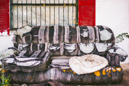 Ruined couch outside an abandoned home in the Florida panhandle