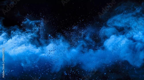 blue powder explosion isolated on black background. blue dust particles splashed. Holi Festival of Colors. A series of beautiful bursts of color